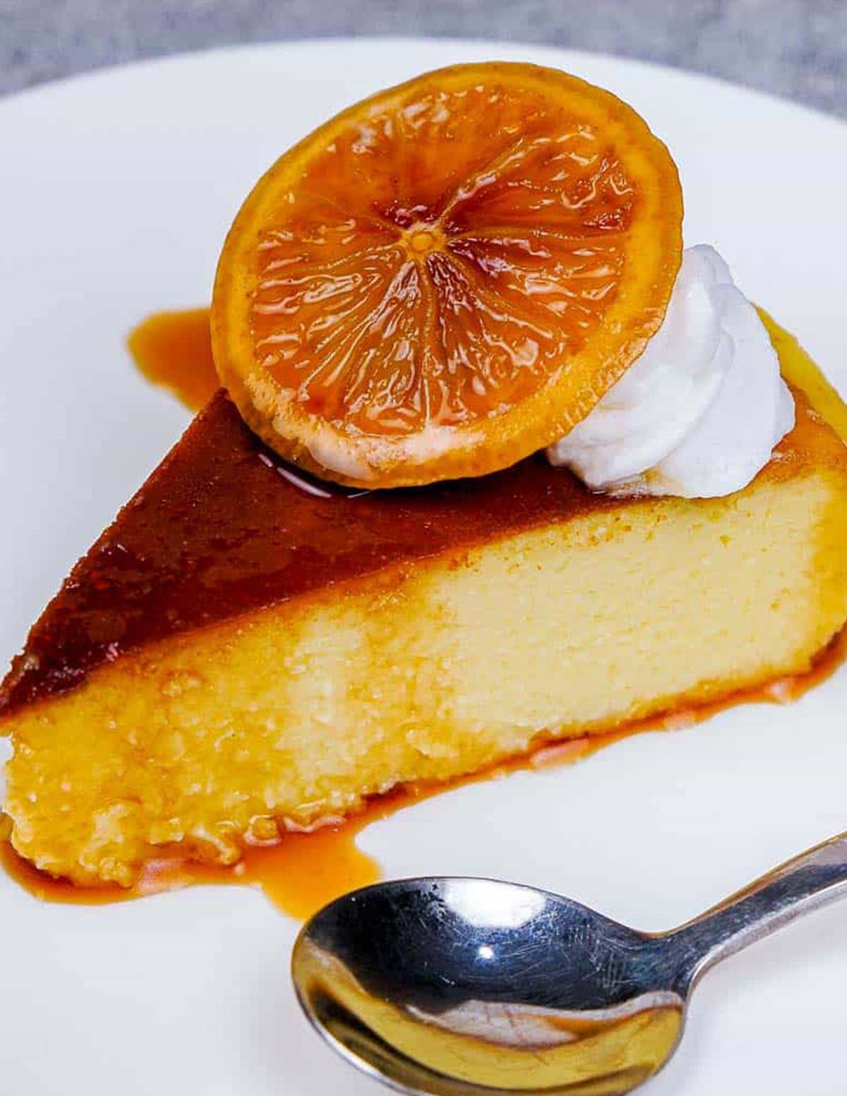 Perfect slice of cheesecake with candied lemons